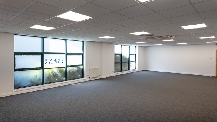 An office interior with glazing to two elevations