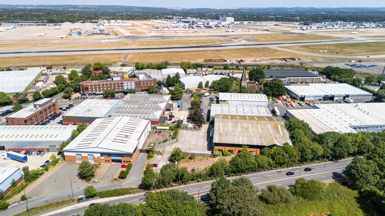 Aerial view across the estate towards the airport